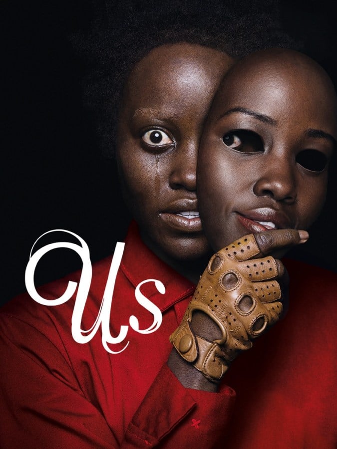 A woman peels off a mask of her own face in "Us"