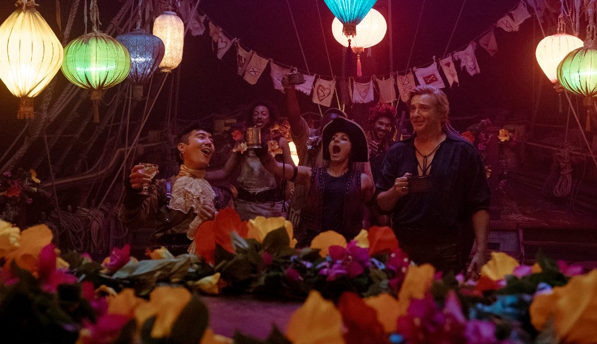 Pirates celebrate at a colorful party in 'Our Flag Means Death.'
