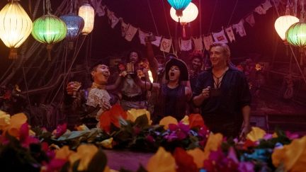 Pirates celebrate at a colorful party in 'Our Flag Means Death.'