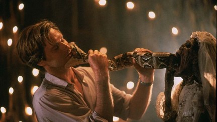 A snake bites Bill Pullman as Dennis Allan in 'The Serpent and the Rainbow' (1988)