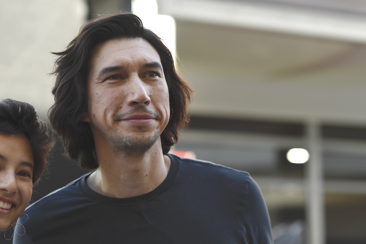Adam Driver walks in the Paddock during previews ahead of the F1 Grand Prix of United States at Circuit of The Americas on October 19, 2023 in Austin, Texas.