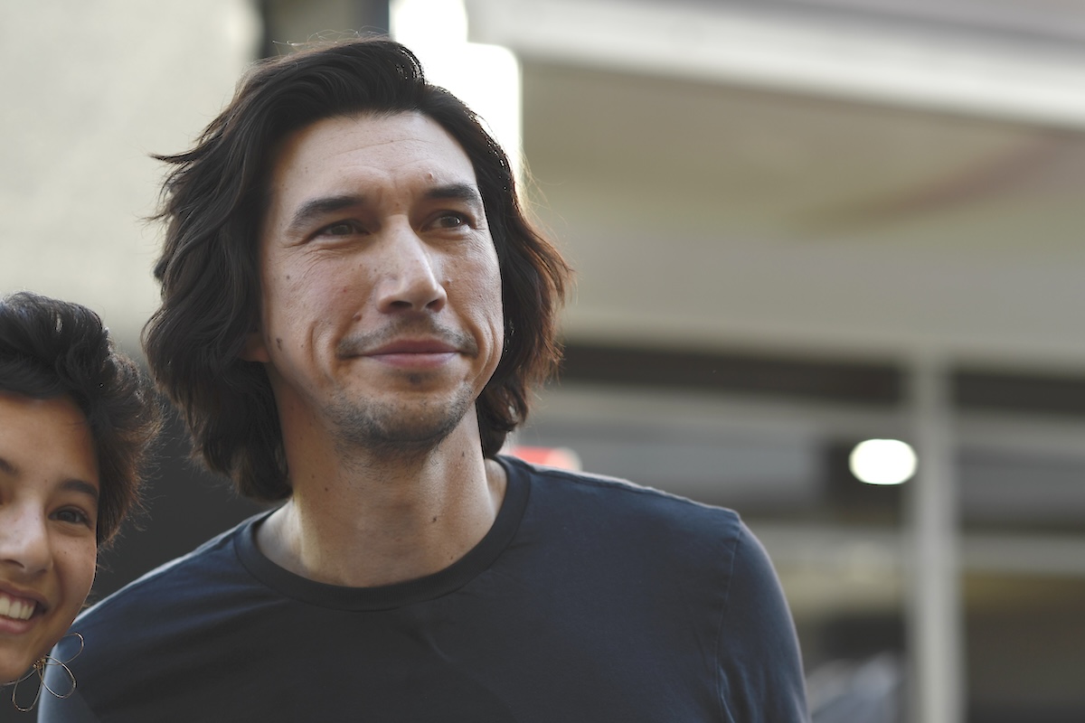 Adam Driver walks in the Paddock during previews ahead of the F1 Grand Prix of United States at Circuit of The Americas on October 19, 2023 in Austin, Texas. 