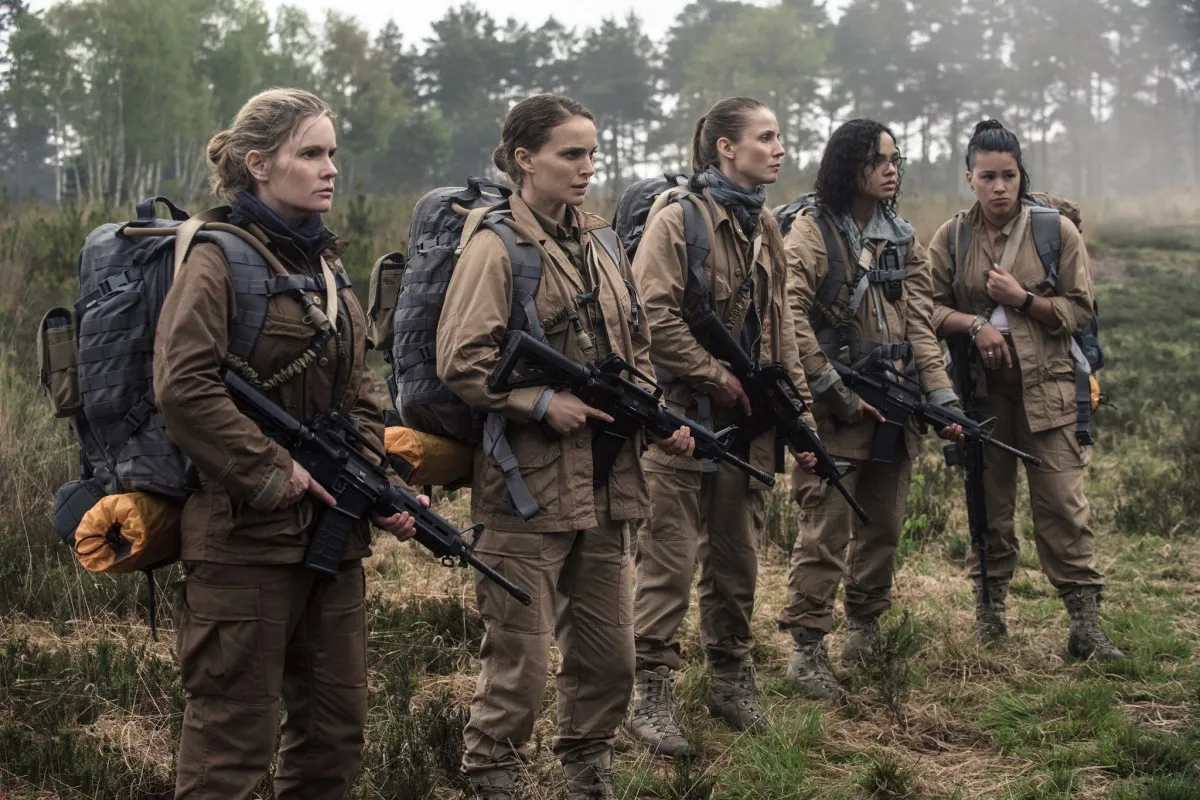 Gina Rodriguez, Jennifer Jason Leigh, Natalie Portman, Tessa Thompson and Tuva Novotnyin stand armed and ready to enter a quarantined swampland in 'Annihilation.'
