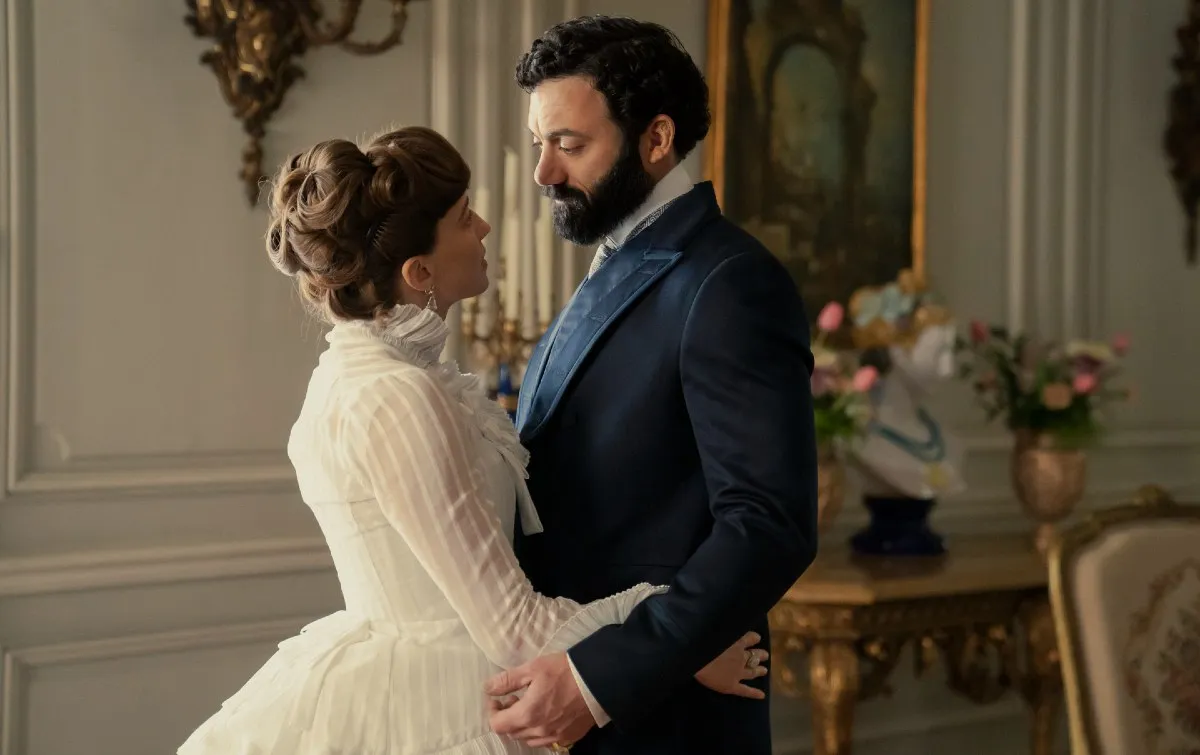 A husband and wife gaze lovingly at each other in 'The Gilded Age.'