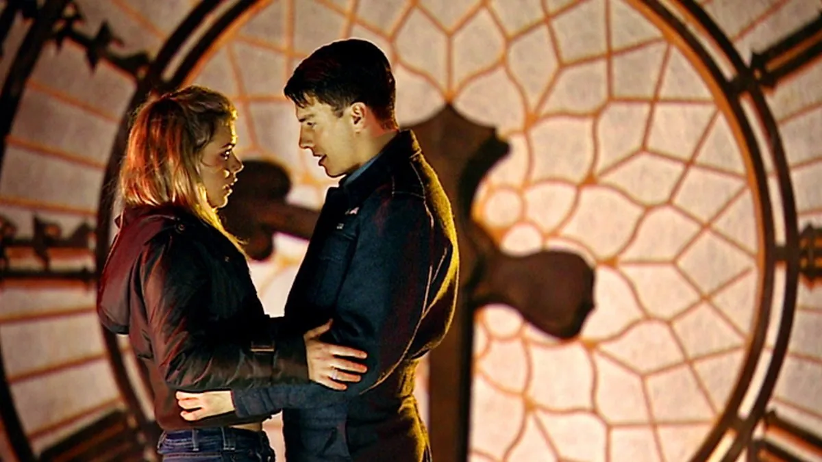 Billie Piper and John Barrowman dancing in front of the Big Ben clockface in Doctor Who (BBC)