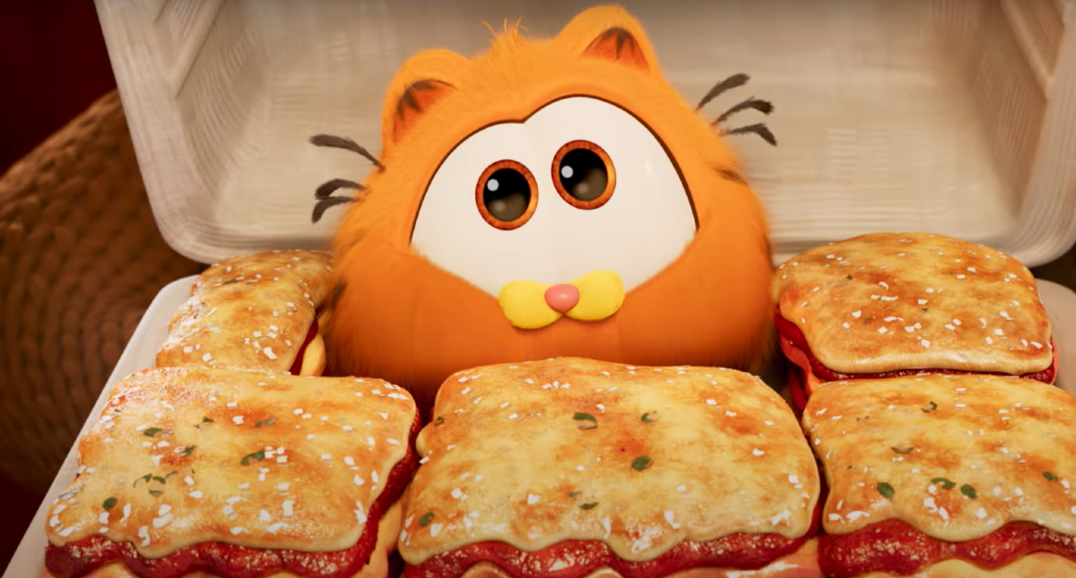 Baby Garfield in a box of lasagna in 'The Garfield Movie'