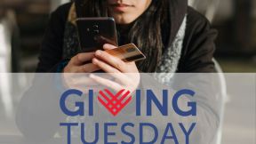 Brown woman holding credit card and phone over the logo for Giving Tuesday.