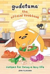 Cover of Gudetama: The Official Cookbook: Recipes for Living a Lazy Life, depicts Sanrio character Gudetama, who is an egg yolk, cooking