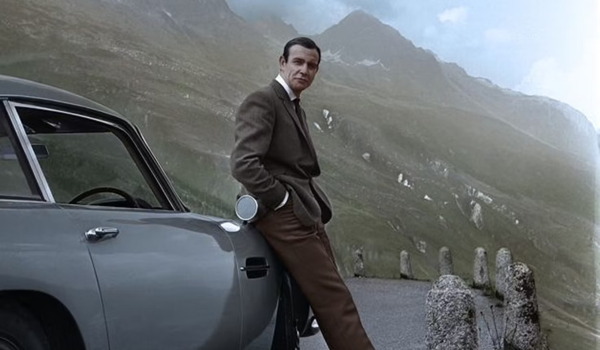 James Bond poses with car in 'Goldfinger' 