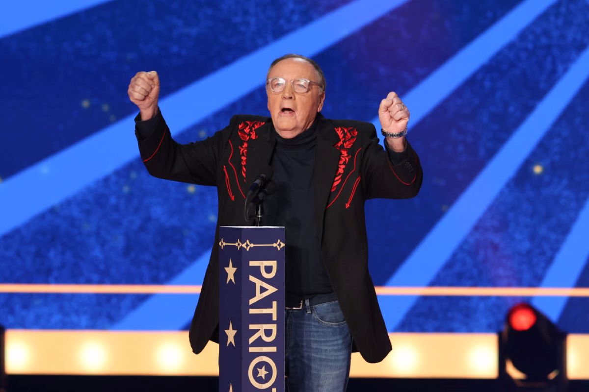 James Patterson raises his fists in celebration after accepting the Back the Blue Award at the 2023 FOX Nation Patriot Awards on Nov. 16 in Nashville, Tennessee.