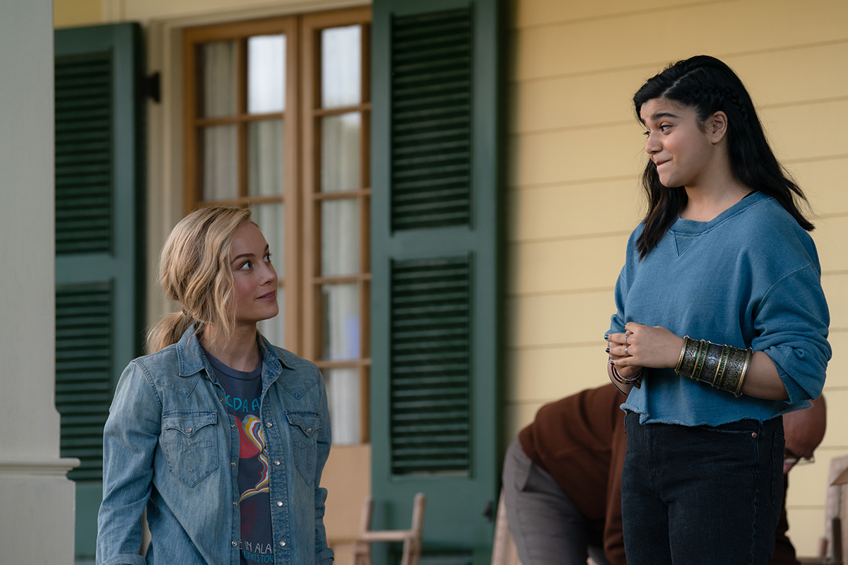 (L-R): Brie Larson as Captain Marvel/Carol Danvers and Iman Vellani as Ms. Marvel/Kamala Khan in Marvel Studios' THE MARVELS. Photo by Laura Radford. © 2023 MARVEL.