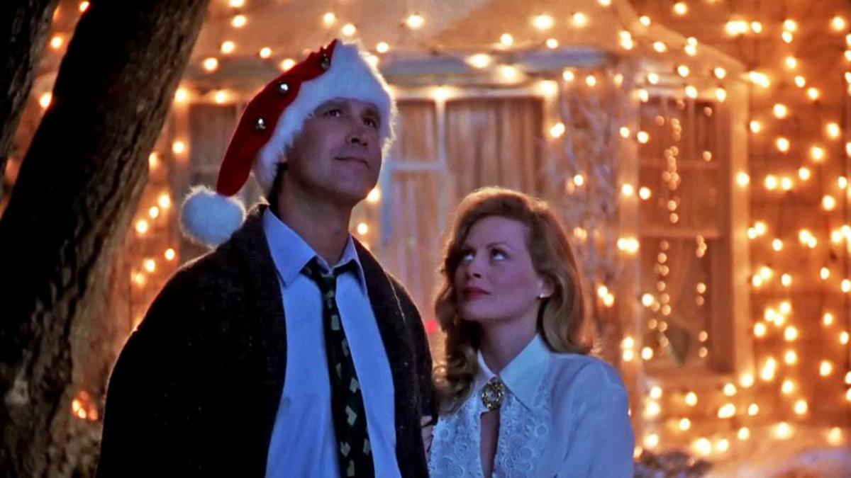 Clark and Ellen Griswold admire their Christmas lights in Christmas Vacation
