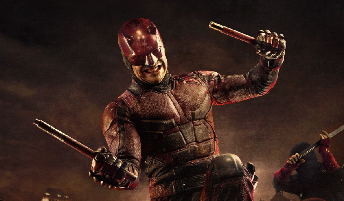 Charlie Cox as Daredevil wielding his batons in a poster for Netflix's Daredevil series. 