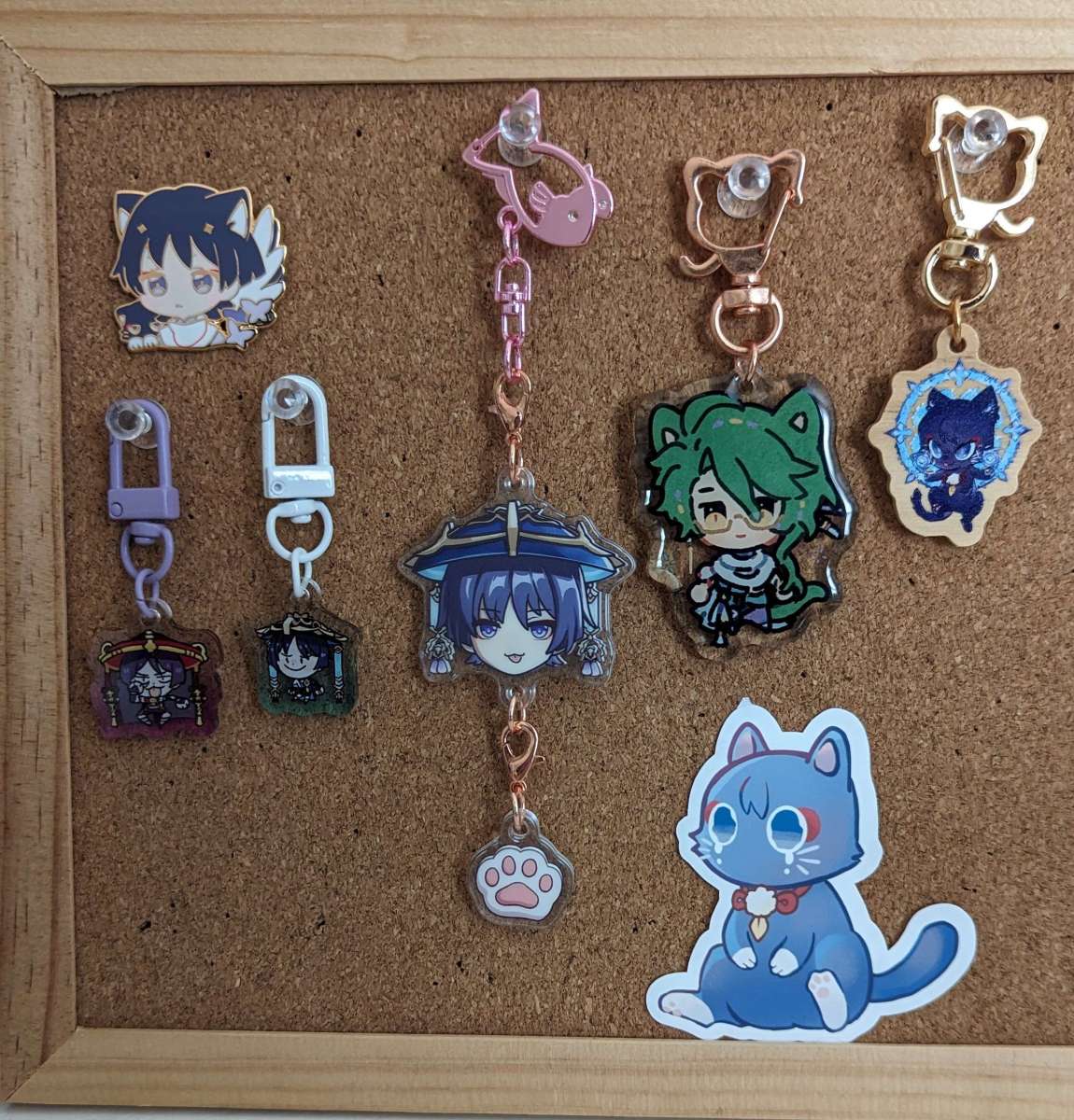 Anime NYC 2023 Genshin merch acquired by one of Ana Valens' friends.