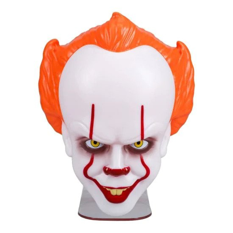 A bulbous white clown's head with orange hair, a red smile whose painted smile goes up through his eyes.