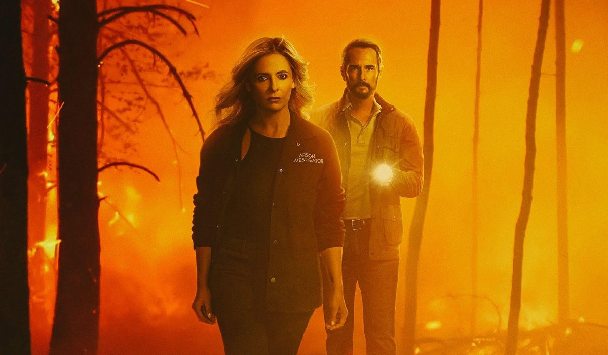 Sarah Michelle Gellar and Rodrigo Santoro walking through a burning forest for Wolf Pack season 1