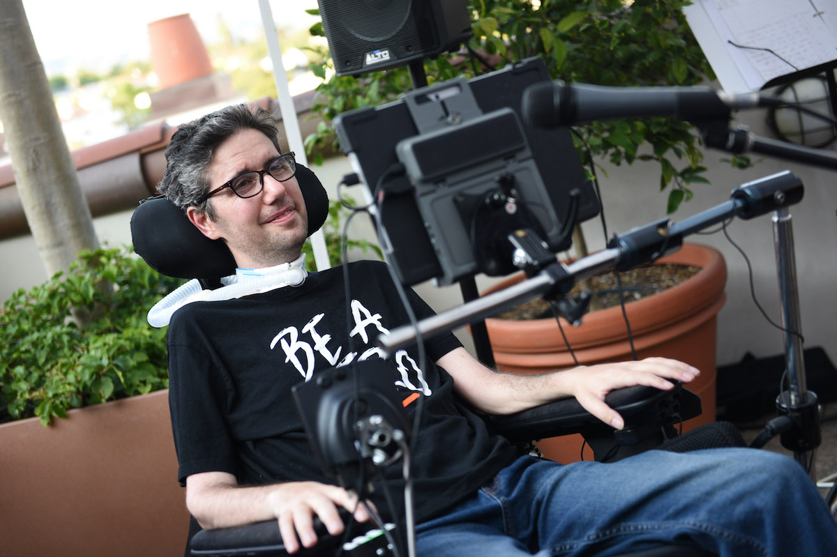 Ady Barkan speaks at a red carpet event