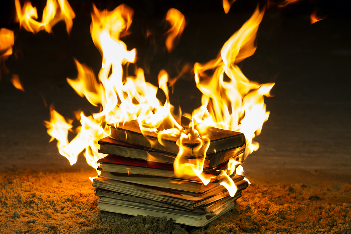 A stack of books burning