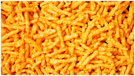 A big pile of Cheetos in full frame.