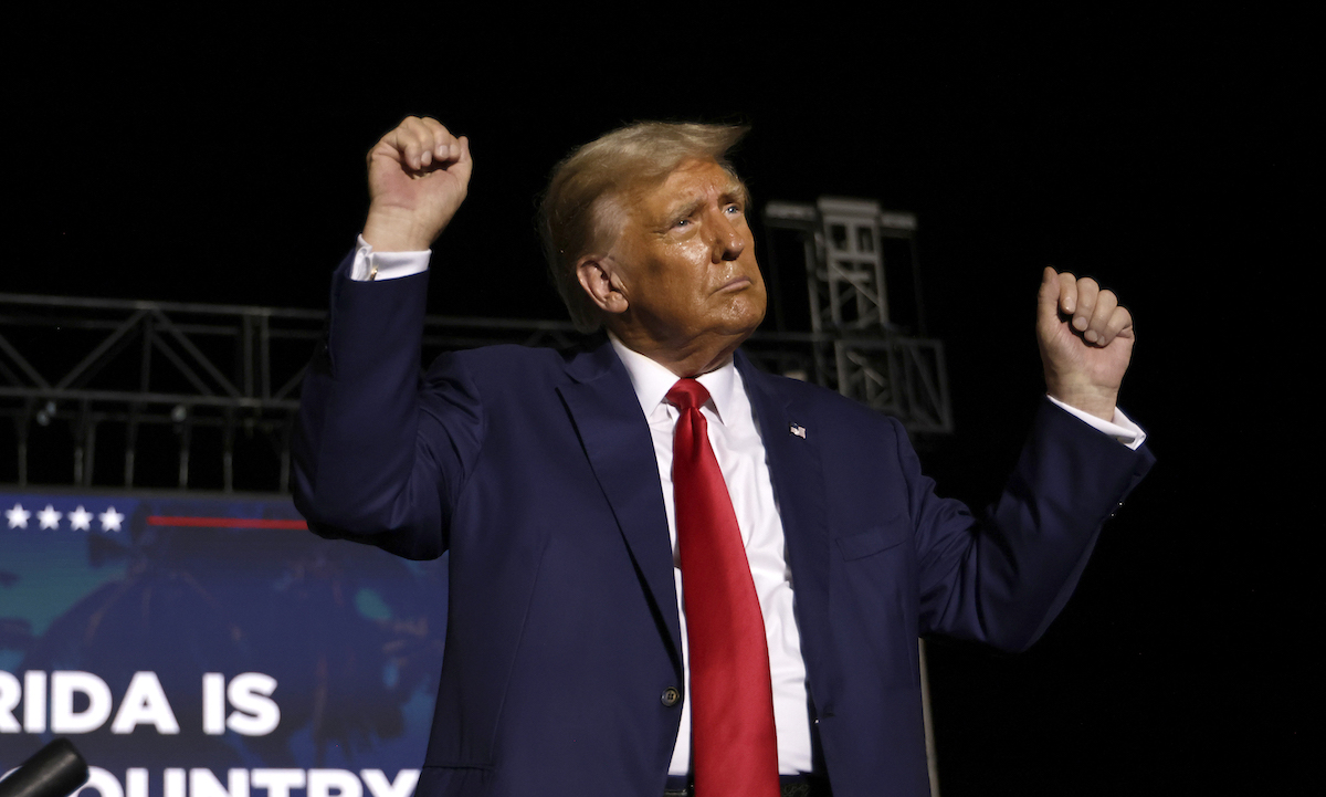 Donald Trump does a sad little celebration dance at a speaking event.