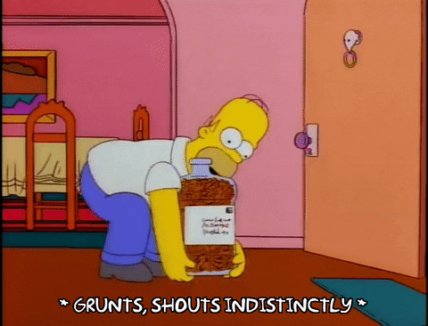 Homer Simpson struggling to lift and carry a jar of pennies