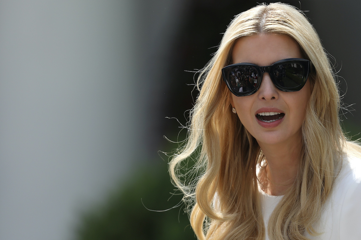 Ivanka Trump gapes at the camera in large dark sunglasses.