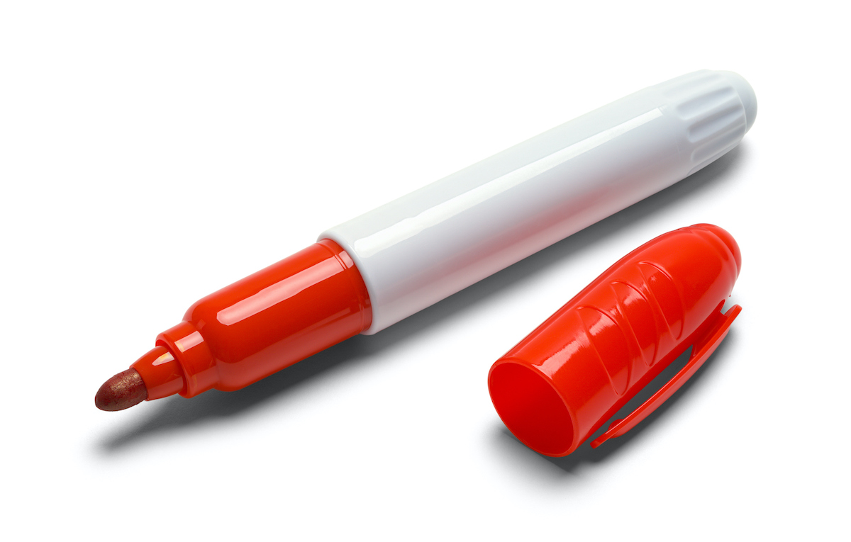 Red Marker with Cap Isolated on White Background.