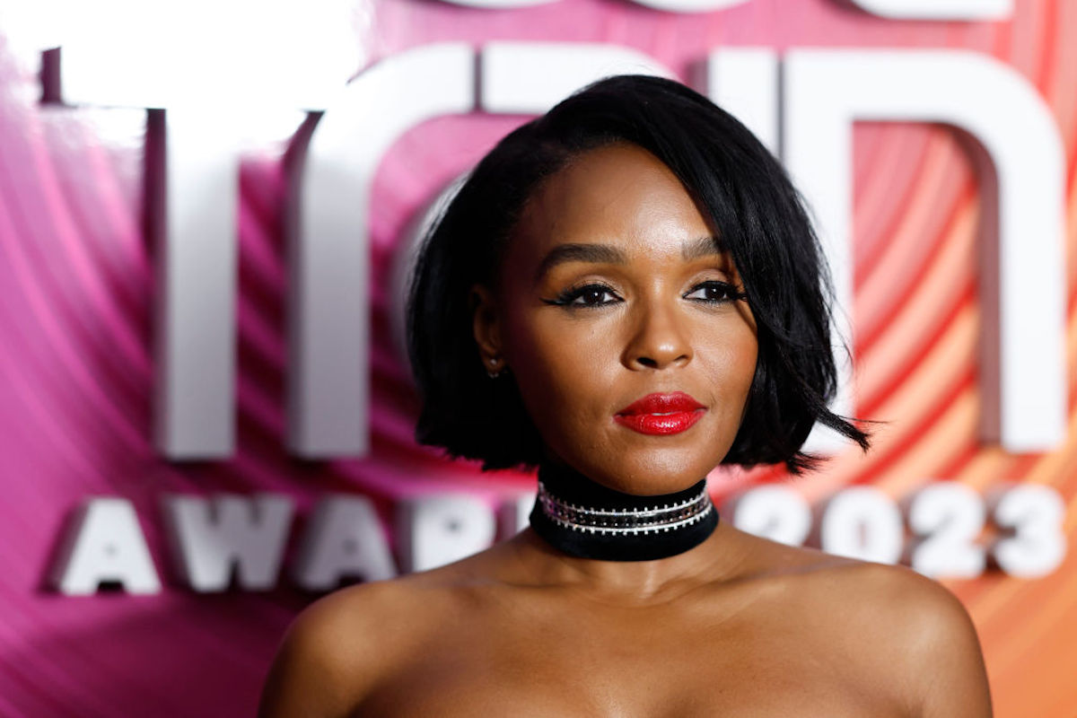 Janelle Monáe gives a sly smile on the red carpet for the 2023 BET Soul Train Awards