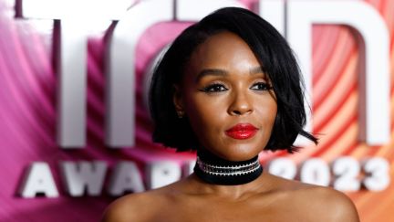 Janelle Monáe gives a sly smile on the red carpet for the 2023 BET Soul Train Awards