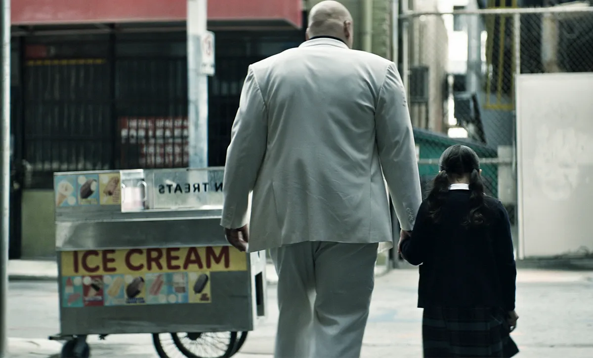 (L-R): Vincent D’Onofrio as Wilson Fisk/Kingpin and Darnell Besaw as young Maya Lopez in Marvel Studios' ECHO, releasing on Hulu and Disney+. Photo courtesy of Marvel Studios. © 2023 MARVEL.