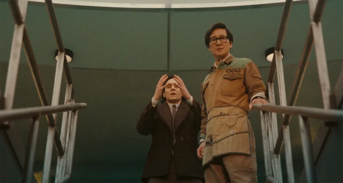 Tom Hiddleston as Loki and Ke Huy Quan as OB standing in the Temporal Loom chamber in Loki season 2 episode 5.