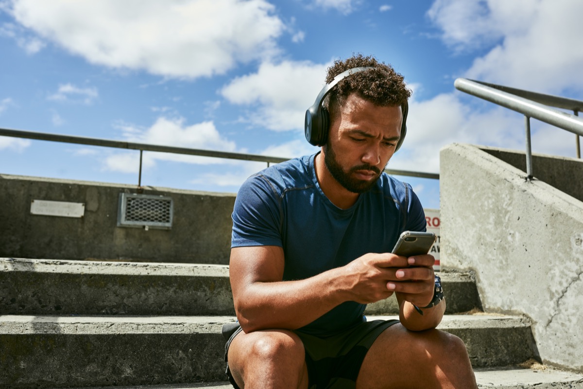 Man listening to music in headphones.