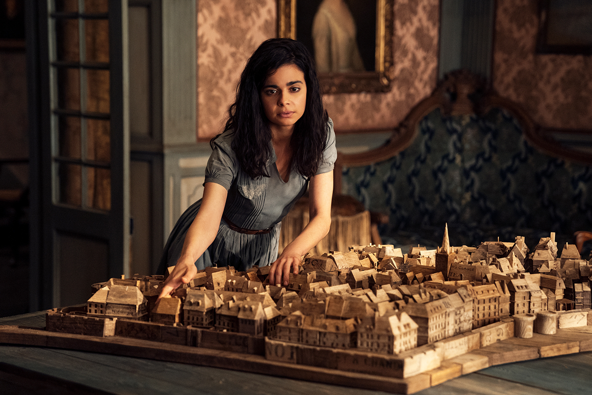 All the Light We Cannot See. Aria Mia Loberti as Marie-Laure in episode 101 of All the Light We Cannot See. Cr. Atsushi Nishijima/Netflix © 2023