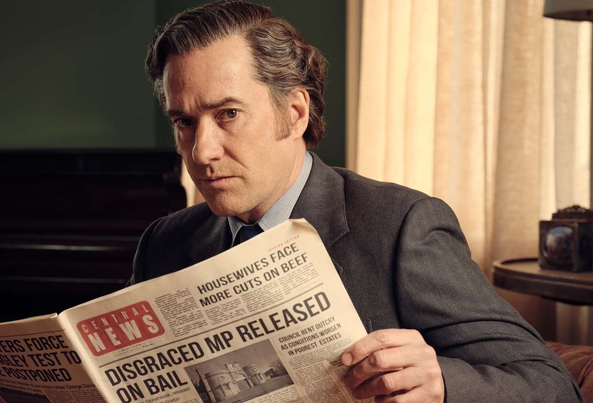 Matthew MacFadyen holds a newspaper in 'Stonehouse'