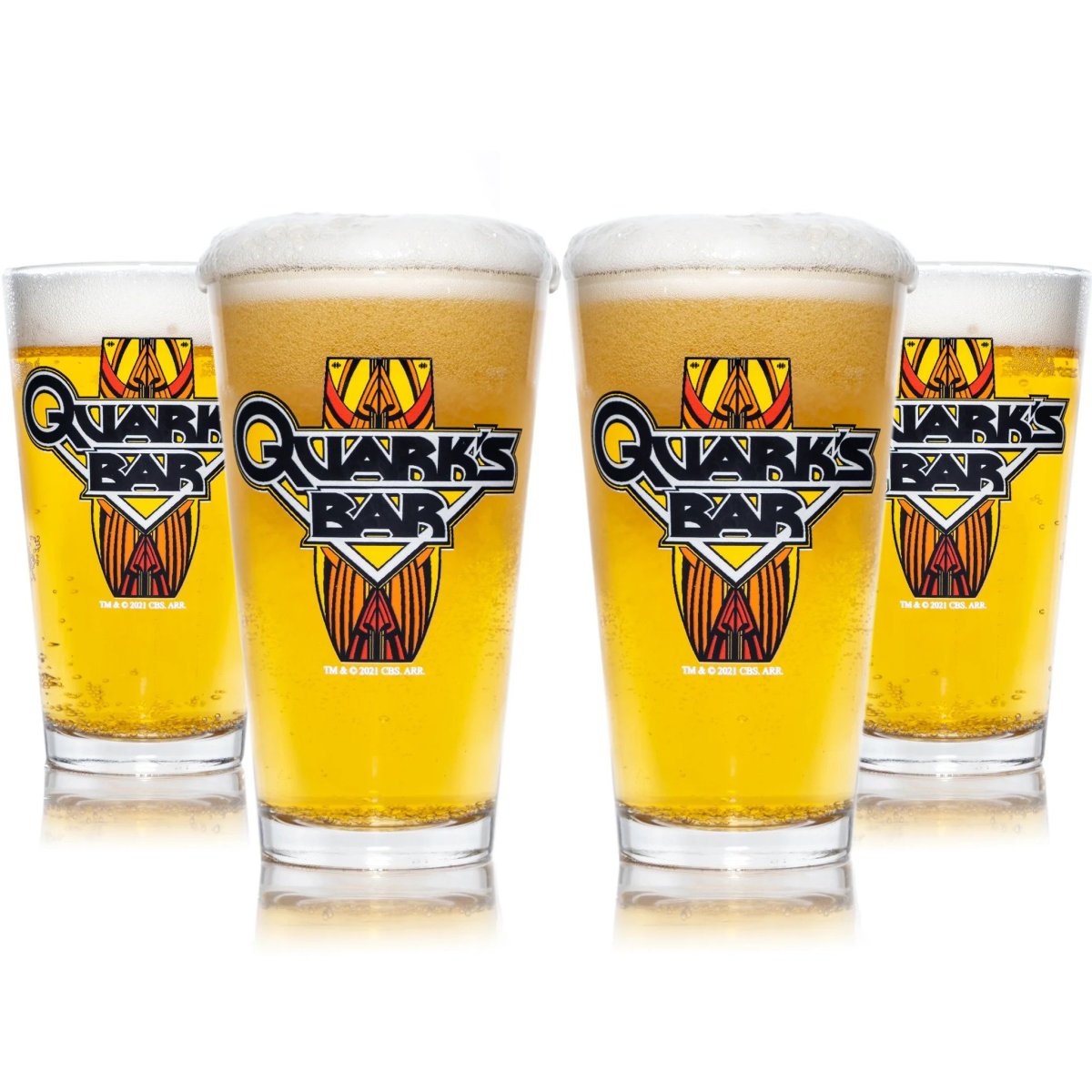 Four pint glasses filled with beer that have the logo for Quark's Bar on them.