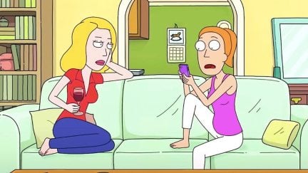 Beth and Summer sit on a couch in 'Rick and Morty.'