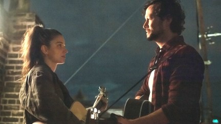 Eve Hewson and Joseph Gordon Levitt standing together in Flora and Son