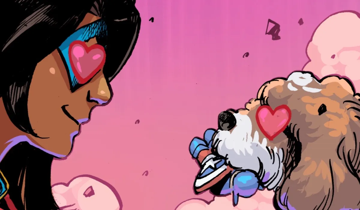 Kamala Khan has hearts in her eyes as she looks at a small brown and white dog