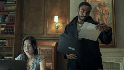Maya Erskine and Donald Glover doing spy work in an office in Mr. & Mrs. Smith