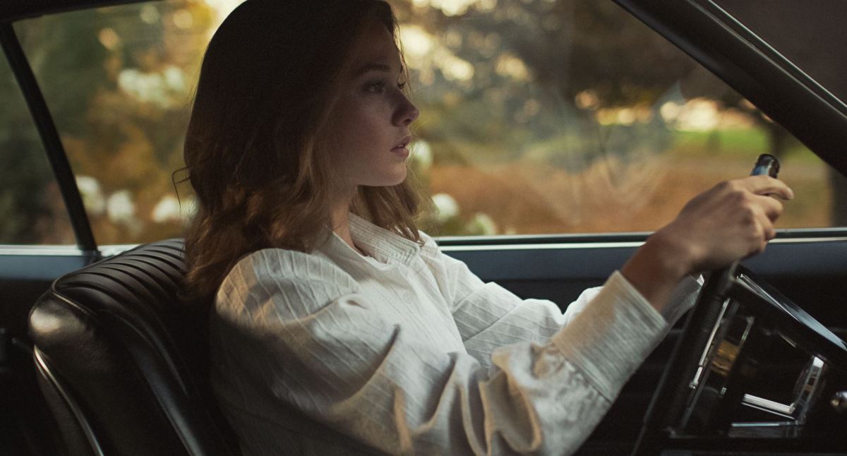 Priscilla driving out of Graceland in 'Priscilla.'