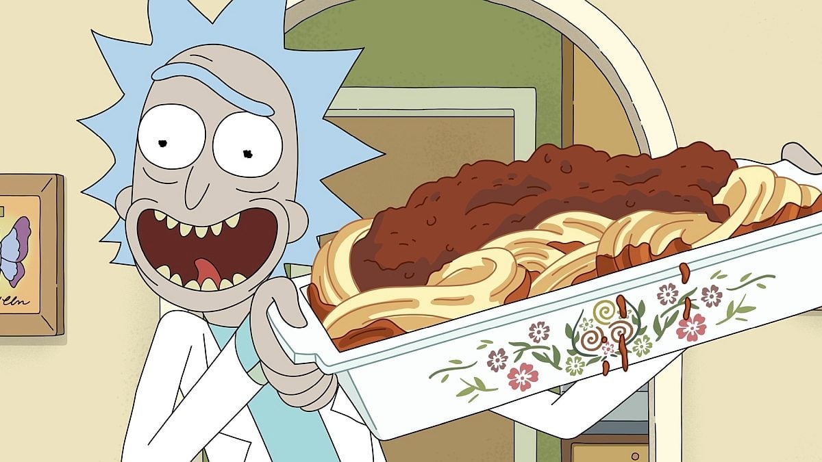 An older animated man holds a big dish of spaghetti while smiling in 'Rick and Morty.'