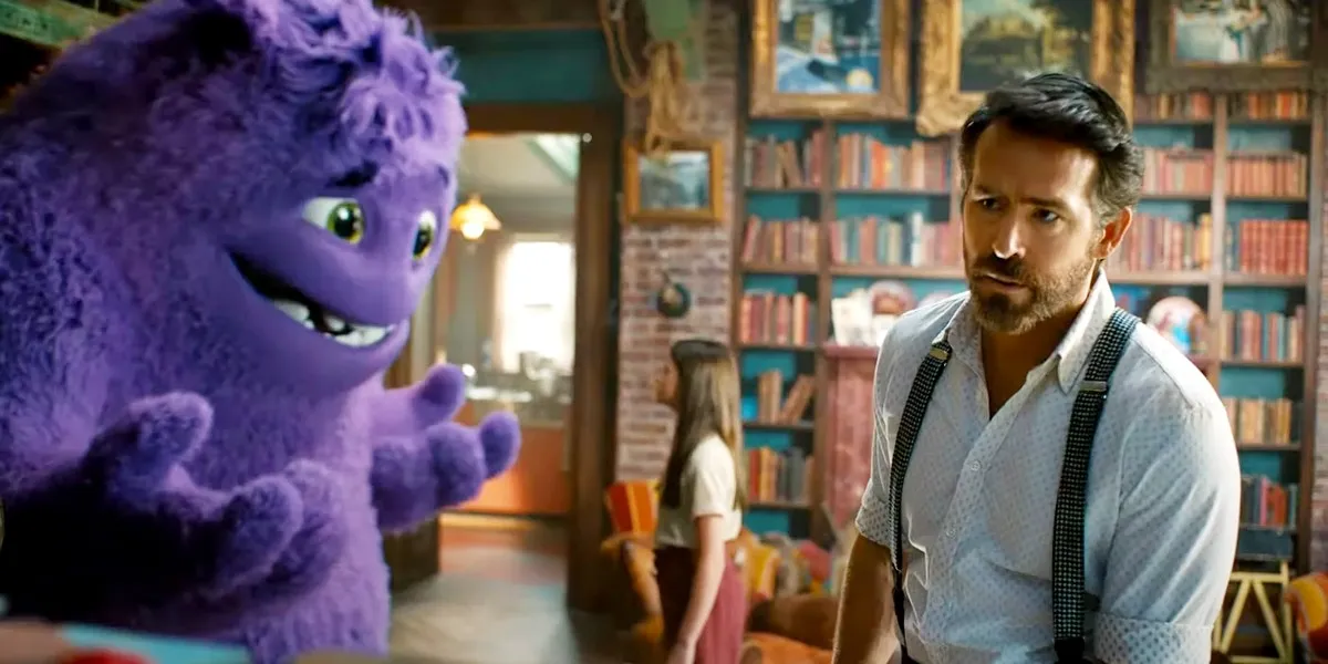 Ryan Reynolds next to a purple imaginary friend voiced by Steve Carell in IF