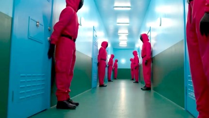 Guards in the hallway in Squid Game: The Challenge.