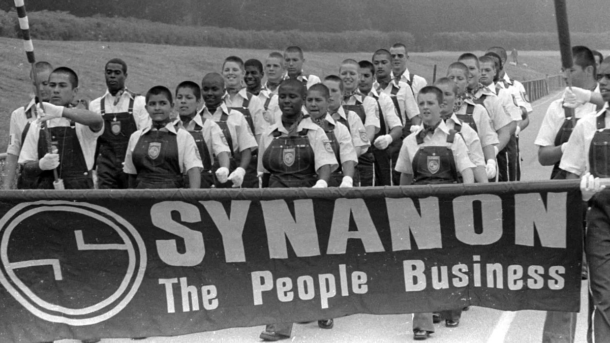 Synanon Members marching in Born in Synanon