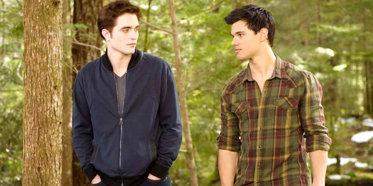 Taylor Lautner as Jacob and Robert Pattinson as Edward in Twilight