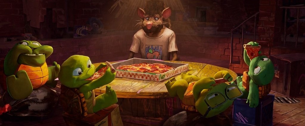 Teenage Mutant Ninja Turtles as little turtle babies next to an younger Splinter all eating pizza. 