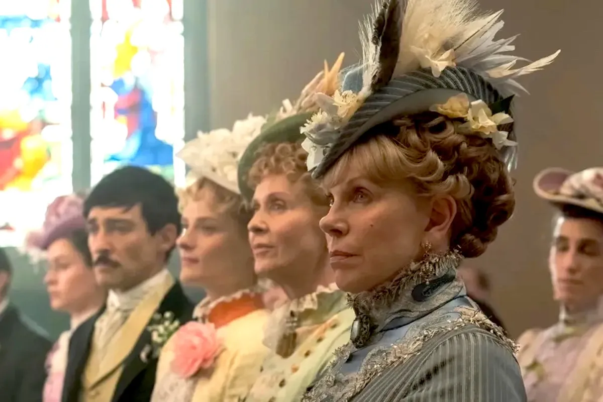 Agnes van Rijn (Christine Baranski) and family stand in church in 'The Gilded Age'