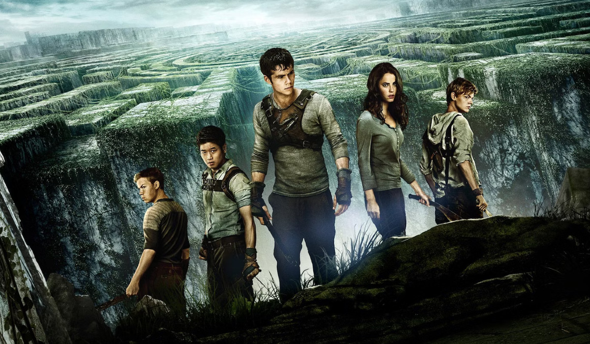 Will Poulter, Ki Hong Lee, Dylan O'Brien, Kaya Scodelario and Thomas Brodie-Sangster on a poster for The Maze Runner.