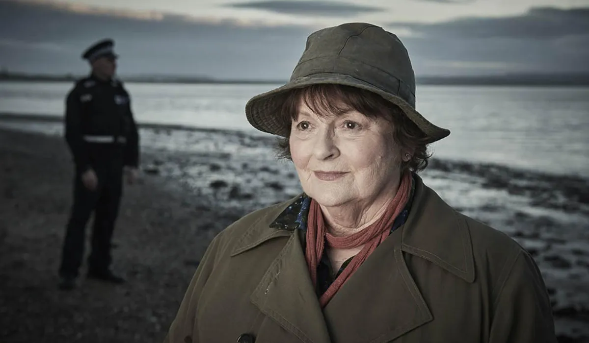 Brenda Blethyn as DCI Vera Stanhope standing on a beach in the 2023 Christmas special