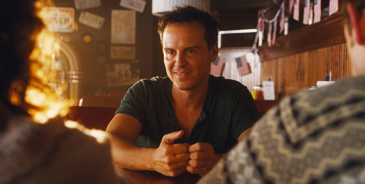 Adam (Andrew Scott) sitting and talking to his parents at the end of All of Us Strangers